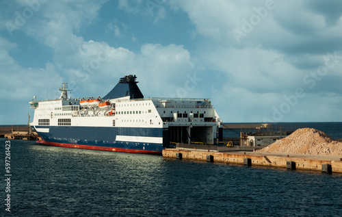 Ferry docked in the port photo