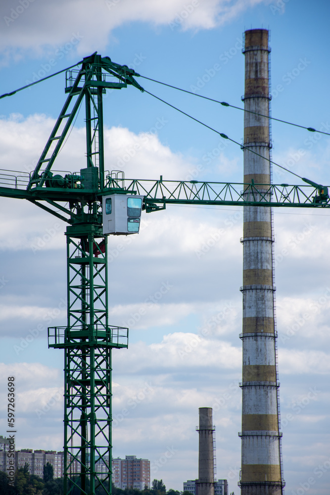 Tower crane on the background of the city