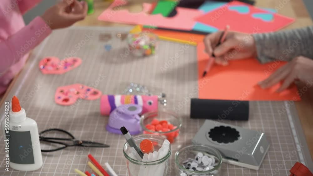 Close up view. Kids papercraft. Making paper bugs out of the empty toilet paper rolls and construction paper. Close up view. Kids papercraft. Making paper bugs out of the empty toilet paper rolls and construction paper.