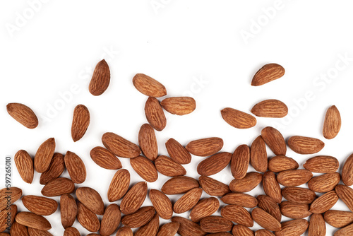 Scattered almonds on a white background.