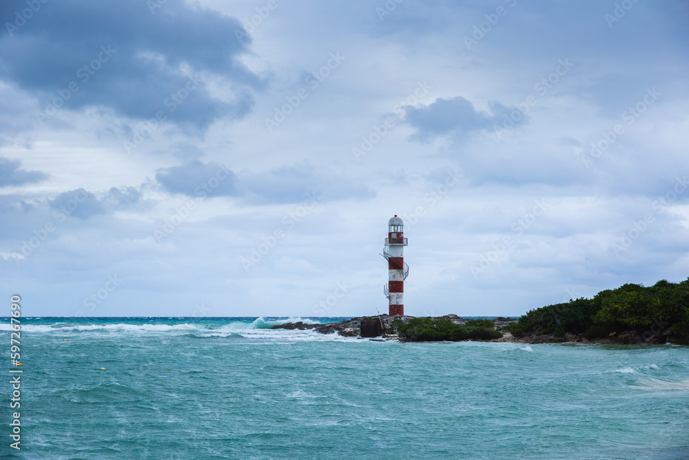 Punta Cancun LightHouse. Tropical storm in the Atlantic Ocean. Beautiful hotel zone, resort with bed wheather. Hurricane in Caribbean Sea, Gulf of Mexico, Cancun.