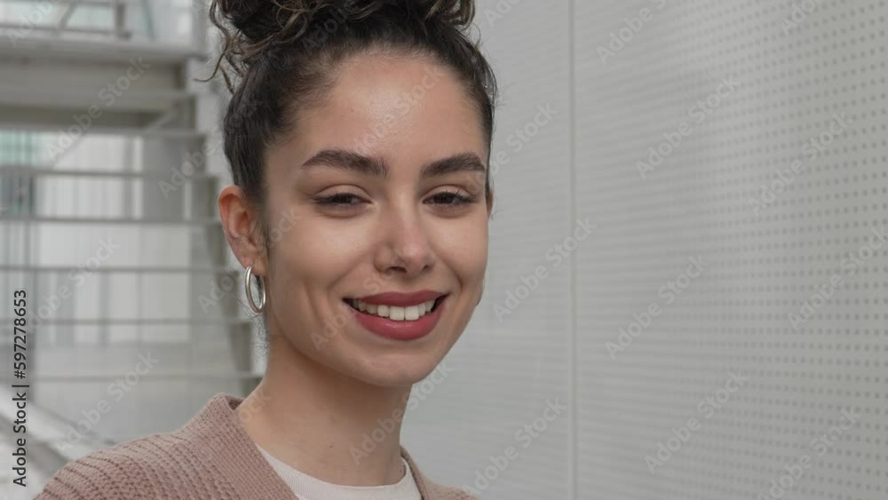 portrait of young Caucasian woman stand outdoor happy smile