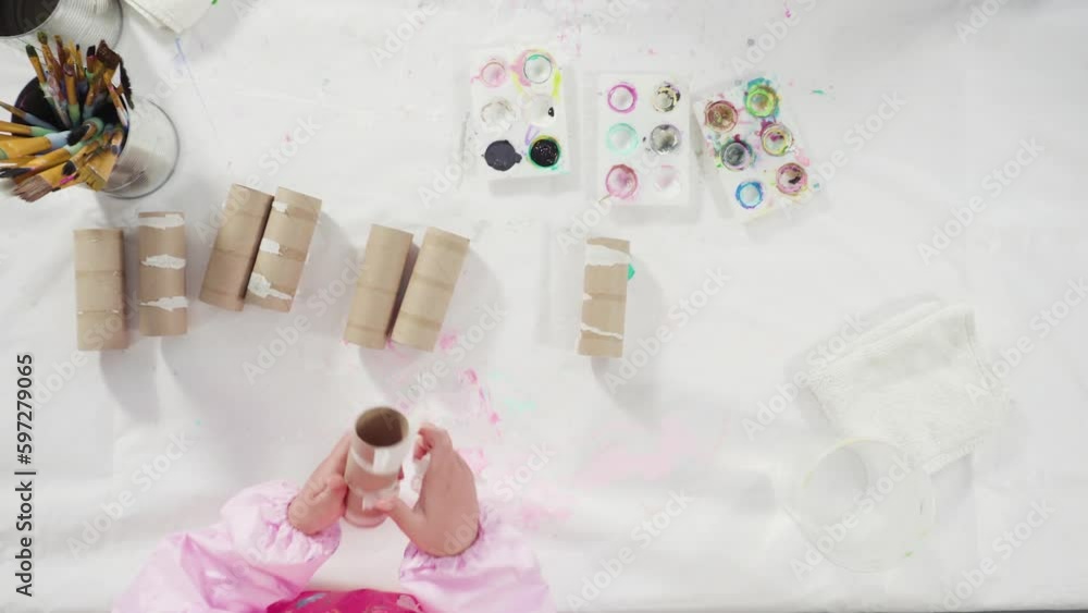 Flat lay. Kids papercraft. Painting empty toilet paper rolls with acrylic paint to create paper bugs. Flat lay. Kids papercraft. Painting empty toilet paper rolls with acrylic paint to create paper bugs.
