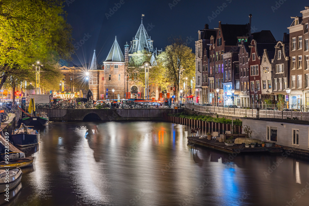 Lights and reflections at night in Amsterdam.