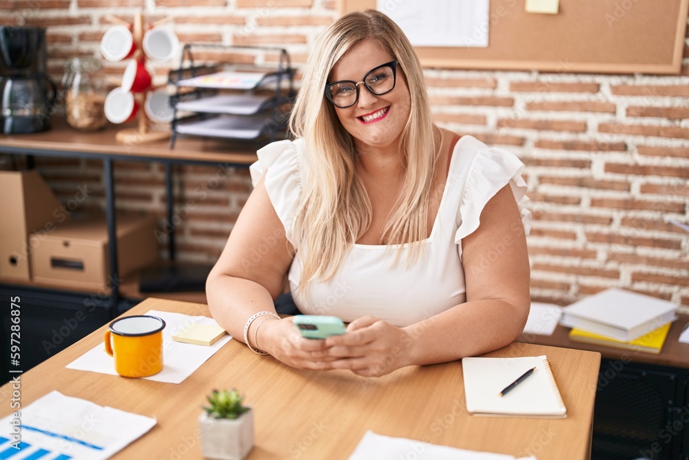 Young woman business worker using smartphone working at office Young woman business worker using smartphone working at office