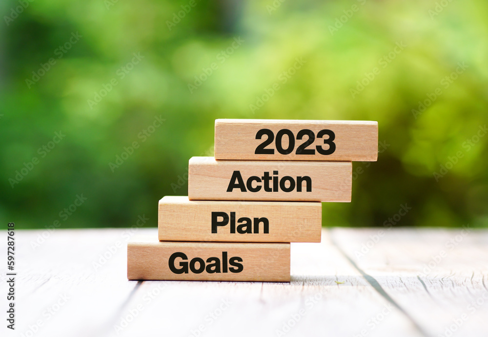 2023 New Year Goal Target, Action, Plan, wooden blocks with the inscription, plan, action in year 2023.             