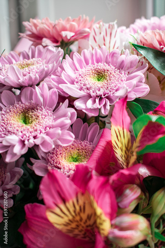 Bouquet with chrysanthemums of various pink shades.
