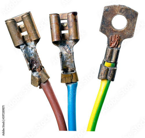Three old collector fittings for connecting an electrical device. Isolated background. photo