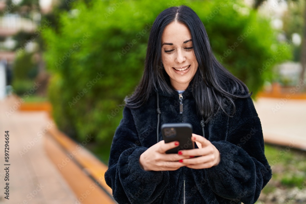 Young caucasian woman smiling confident using smartphone at park Young caucasian woman smiling confident using smartphone at park