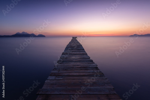 Fototapeta Naklejka Na Ścianę i Meble -  pier at sunrise, coast