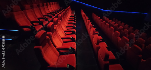  Cinema movie theater concept background. Red cinema seats .