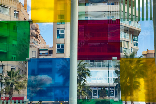 MALAGA, SPAIN - MARCH 2023 The colorful glass cube of Centre Pompidou Malaga modern art gallery