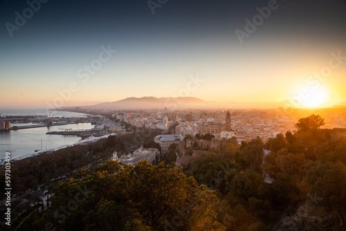 view over Malaga at sunset travel banner © Melinda Nagy
