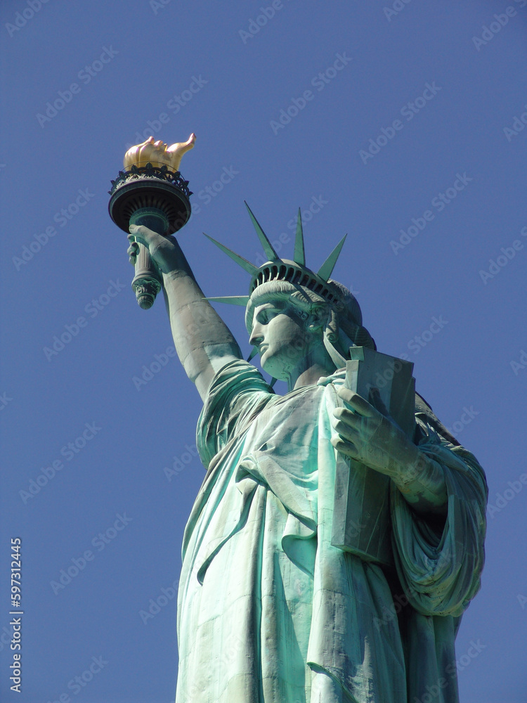 Fototapeta premium Statue of liberty on a sunny day NYC