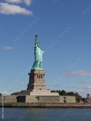 Statue of liberty on a sunny day NYC © Henry