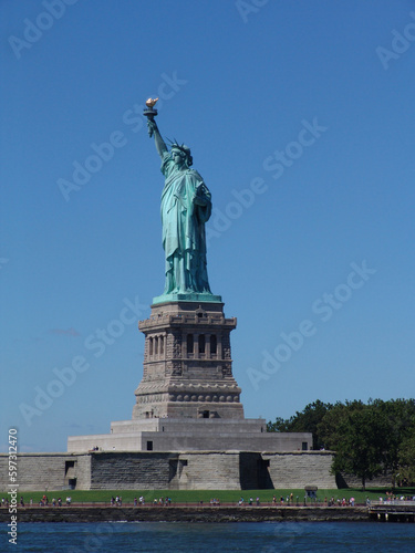 Statue of liberty on a sunny day NYC