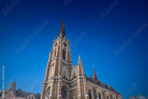 The Name of Mary Church, also known as Novi Sad catholic cathedral or crkva imena marijinog during a sunny summer afternoon. This cathedral is one of the most important landmarks of Novi Sad, Serbia. photo