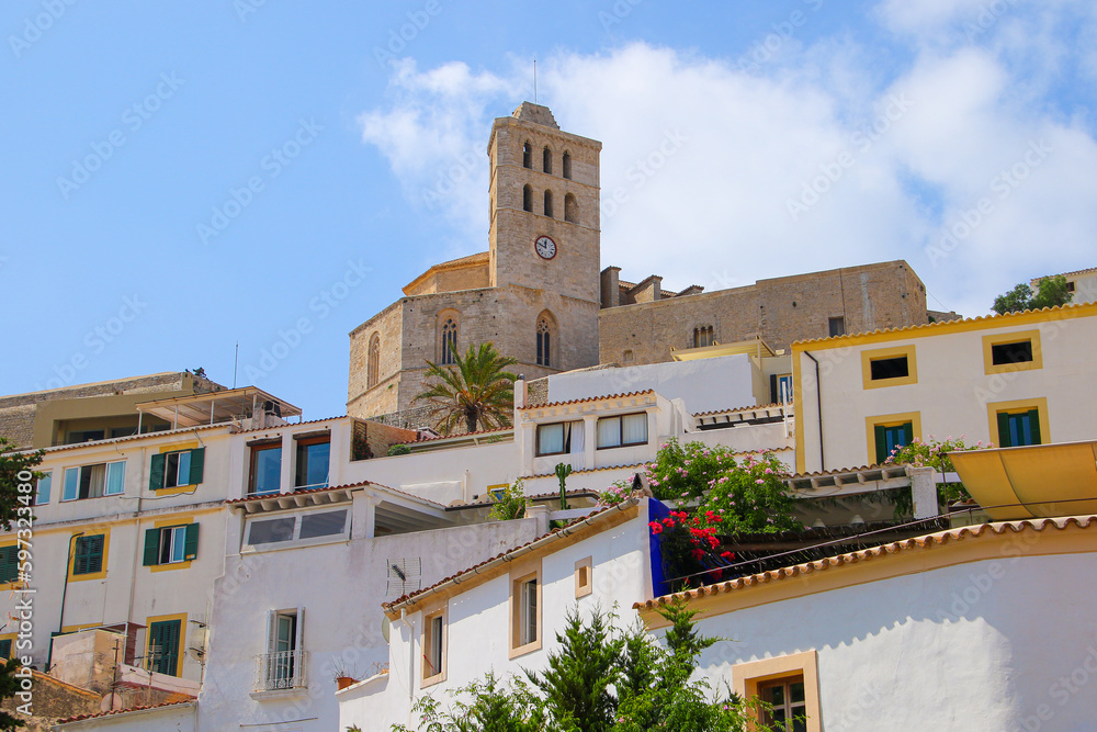 Saint Mary cathedral at the top of the Castle of Eivissa in Dalt Vila, the old city center of Ibiza in the Balearic Islands, Spain - Medieval fortress with whitewashed houses in the Mediterranean Sea