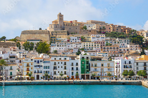 Fototapeta Naklejka Na Ścianę i Meble -  Saint Mary cathedral at the top of the Castle of Eivissa in Dalt Vila, the old city center of Ibiza in the Balearic Islands, Spain - Medieval fortress with whitewashed houses in the Mediterranean Sea