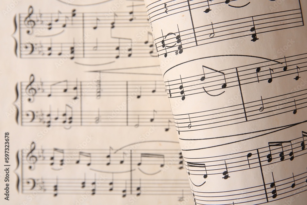 Sheets with music notes as background, top view. Space for text Sheets with music notes as background, top view. Space for text