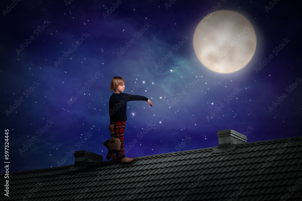 Boy holding toy and sleepwalking on roof under starry sky with full moon