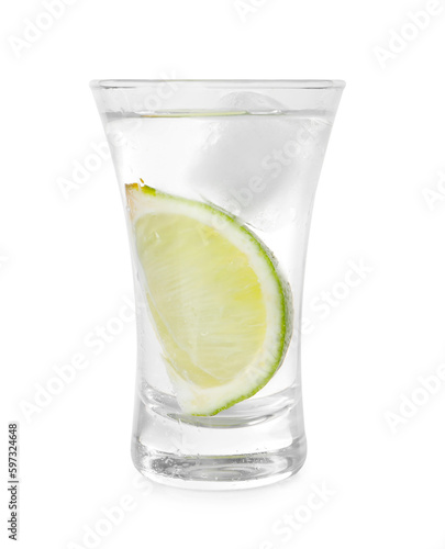 Glass of vodka with lime and ice isolated on white