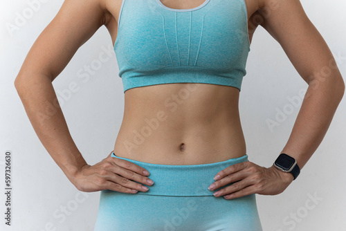 Obraz na płótnie healthy and fit., Image for fitness woman in sportswear, young female model doing exercise with muscular body. look strong w salonie