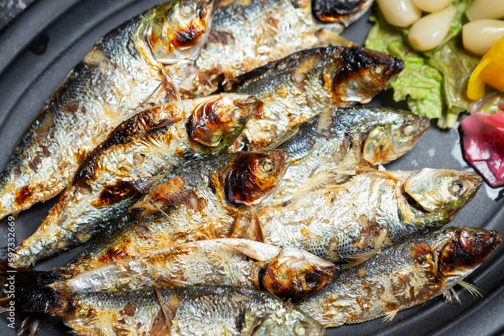 grilled fish on a plate grilled fish on a plate