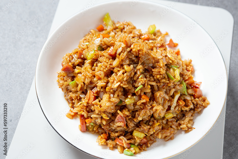 Sausage vegetable fried rice on plate Sausage vegetable fried rice on plate