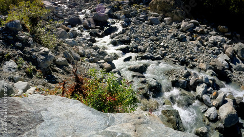 pretty mountain ridge high land fast waterfall at summer day - photo of nature