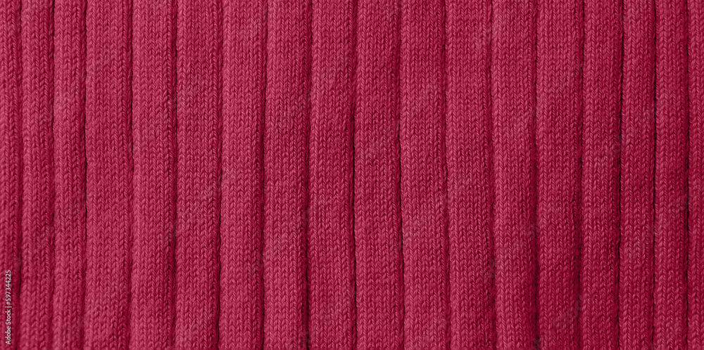 Fototapeta premium Knitted viva magenta fabric, closeup