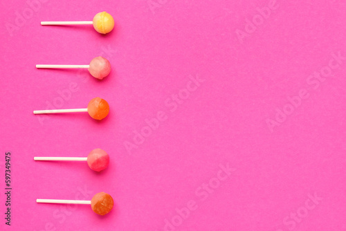 Sweet lollipops on pink background © Pixel-Shot