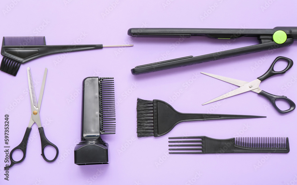 Composition with hairdressing accessories on lilac background