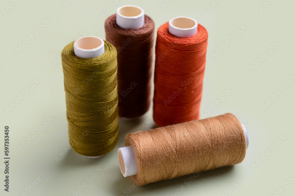 Set of sewing threads on light background Set of sewing threads on light background