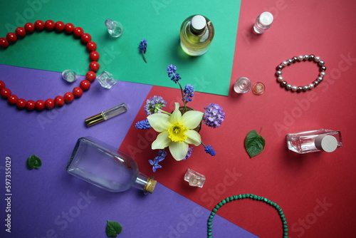 jewelry, perfume bottles, aroma, smell, flowers on colorful background