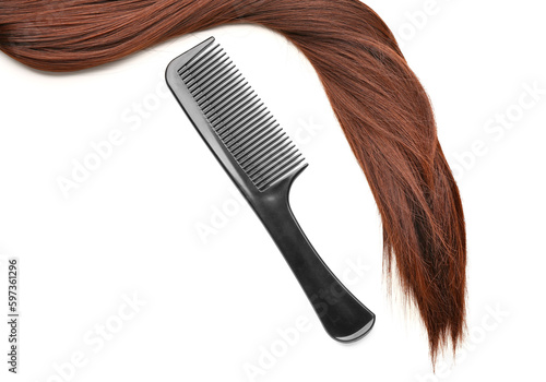 Brown hair with comb on white background