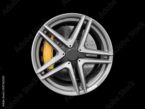Car alloy wheel and tyre isolated on black background. New alloy wheel with tire and yellow carbon ceramic brakes. Alloy rim isolated. Car wheel disc. Car spare parts...