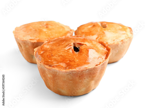 Three golden brown meat pie...
