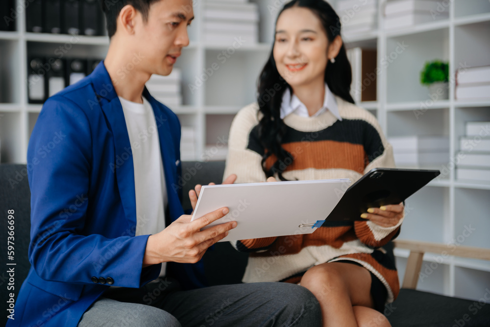 Business team meeting present.professional investor working with Finance managers task. with laptop smart phone and digital tablet Business team meeting present.professional investor working with Finance managers task. with laptop smart phone and digital tablet