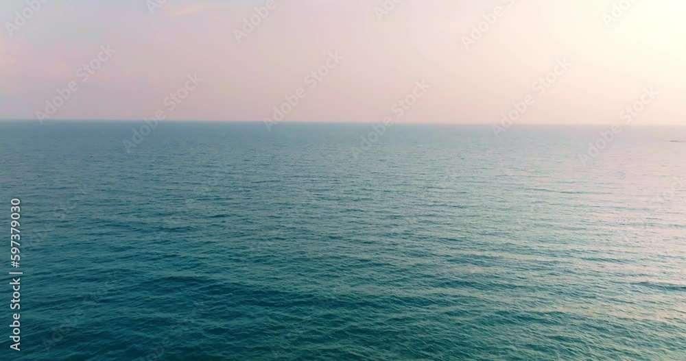 Aerial drone view of clear turquoise sea and waves over the ocean. Aerial drone view of clear turquoise sea and waves over the ocean.