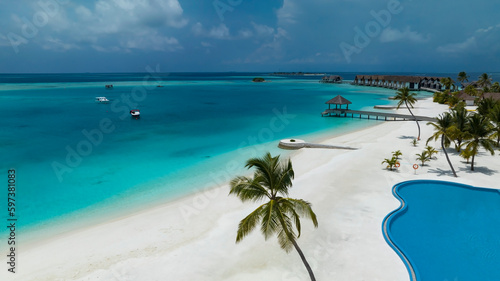 Fototapeta Naklejka Na Ścianę i Meble -  Summer on the sandy beach and turquoise Tropical beach with maldives paradise scenery seascape with water villas as amazing sea and lagoon beach, Exotic tourism