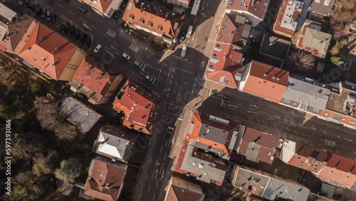 Time lapse aerial view cars speeding through sunny urban intersection, Stuttgart, Germany
