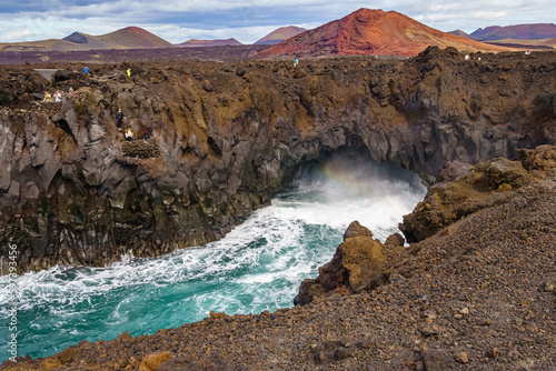 Cliffs of Los Hervideros in Lanzarote. Canary Islands. Spain photo