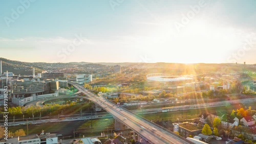 Time lapse cars speeding on highway among sunny Untertuerckheim district, Stuttgart, Germany
