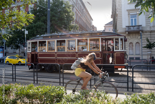 Vintage tram and bicyclist on a street