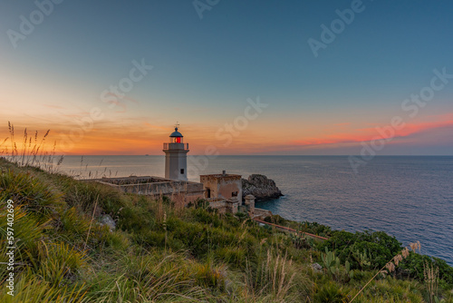 The Capo Zafferano lighthouse at dusk, province of Palermo IT © Davide D. Phstock