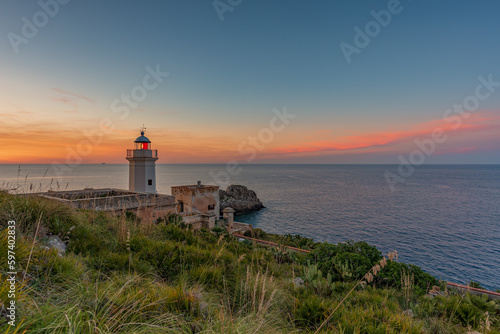 The Capo Zafferano lighthouse at dusk, province of Palermo IT © Davide D. Phstock
