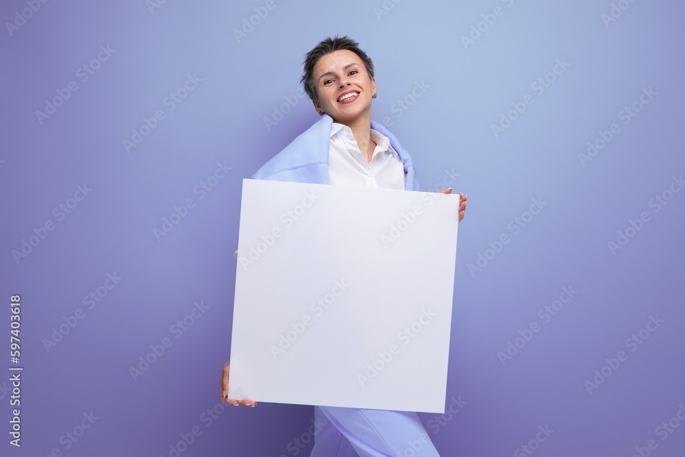 young lady holding white mockup paper young lady holding white mockup paper