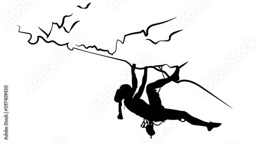 Silhouette einer Kletterin auf einem Felsen