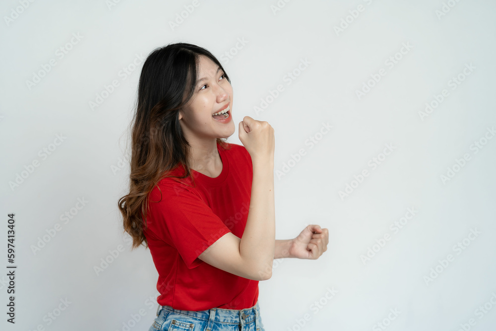 Attractive Asian beautiful woman standing on white background and doing hand gestures.